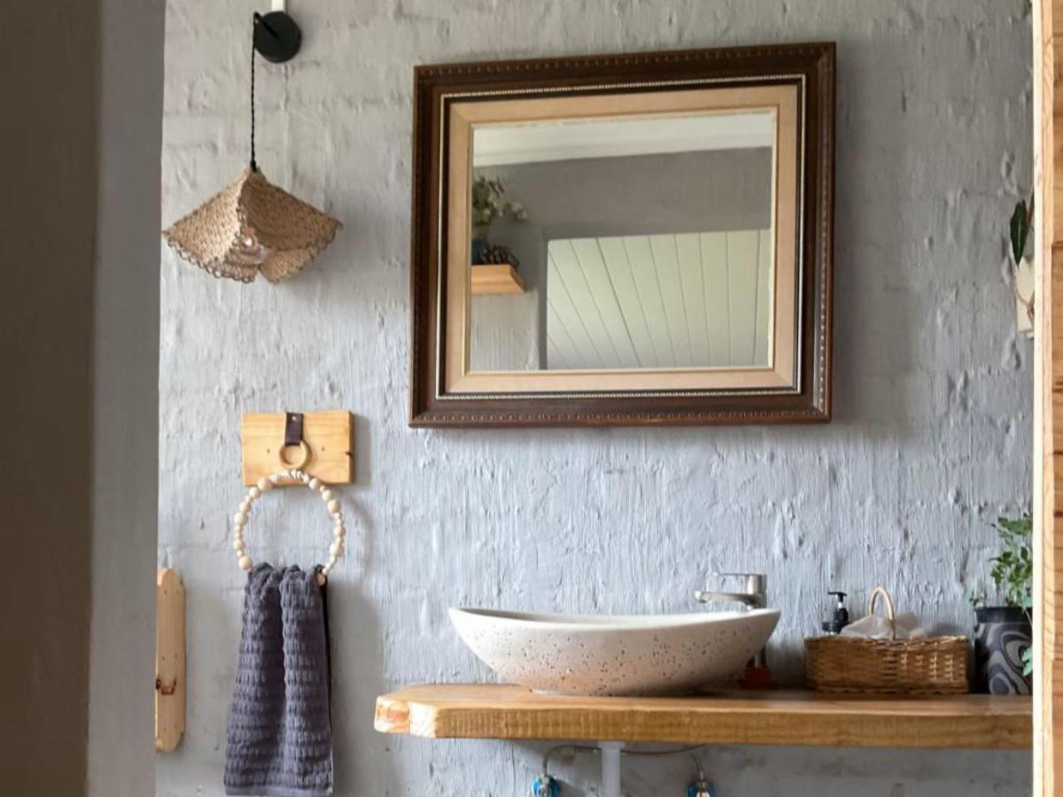 Bathroom with wooden vanity
